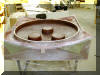 Tailpiece in mold.  Each bump is a recess for 4 cooling fans, three total.  16 OCT 2001  Chuck Hards image 