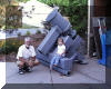 Bruce Grim & granddaughter with the base of the 81 cm (32") telescope.  26 JUN 2001